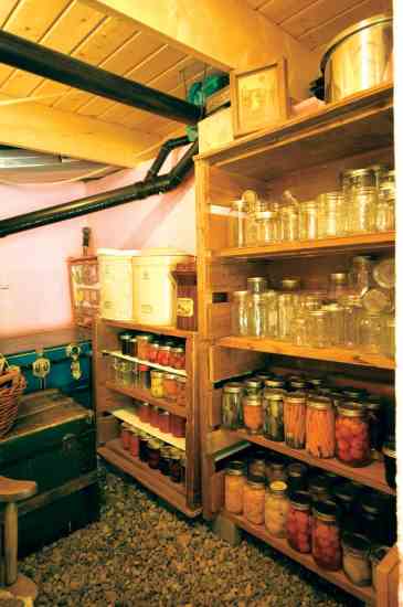 Denise stores canning supplies in a 100-square-foot root cellar.
